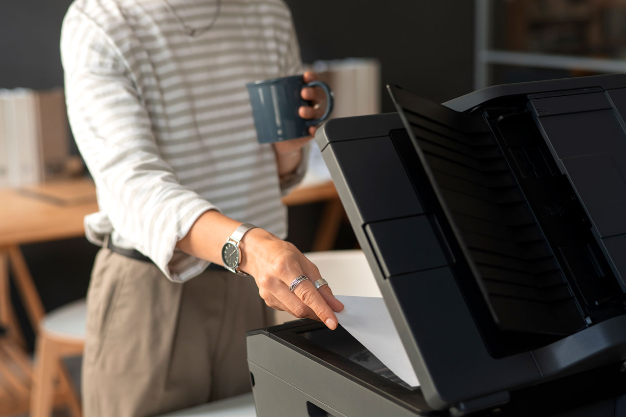side-view-employee-using-printer-work